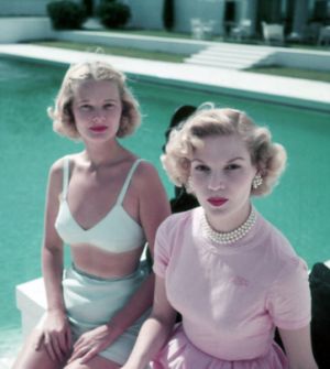 A 1955 photograph of CZ Guest, with Joanne Connelly in Palm Beach Fla by slim aarons.jpg